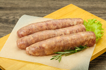 Raw pork meat sausages for grill