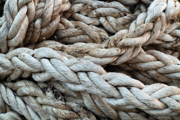 Used and frayed rope in a heap.