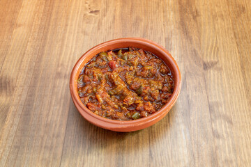 Spanish Manchego pisto served in a clay pot