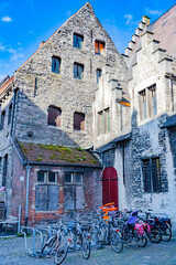 Grey brick building and bicycle parking near Gravensteen  in Ghent, Belgium