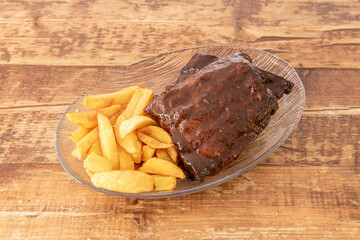 Rib dish with potato garnish