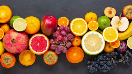Fruit sources of vitamins, background fruits Fresh . Fresh fruits. Top view. Assorted fruits...