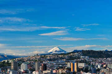 A clear morning in Quito, allows to observe the Cotopaxi Volcano