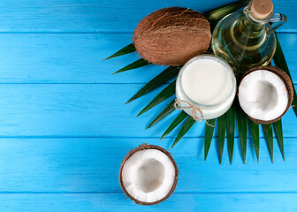 coconut oil and coconut on a blue background