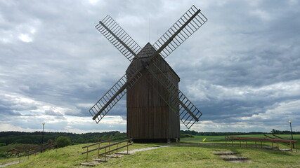 Plakat Windmill in the middle of forest