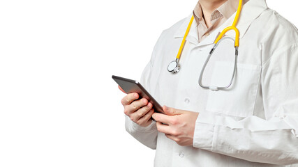 Doctor man in a white coat with a tablet on a white background. Isolated.