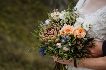 Obraz na płótnie Canvas wedding bouquet of the bride, boho style, outdoor, dry flowers