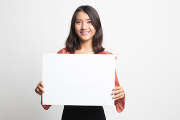 Naklejka premium Young Asian woman with white blank sign .
