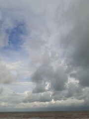 Fototapeta na wymiar Stormy clouds over the sea