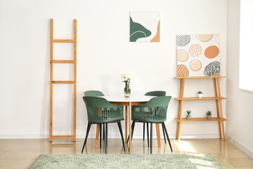 Interior of modern living room with table and chairs