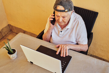 Elderly woman managing her home business