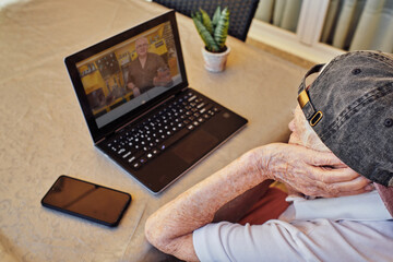 Elderly woman managing her home business
