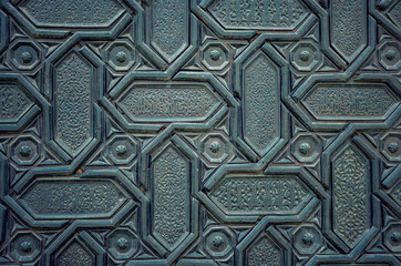 Close-up of a wooden door called Door of Forgiveness in Seville Cathedral, Spain