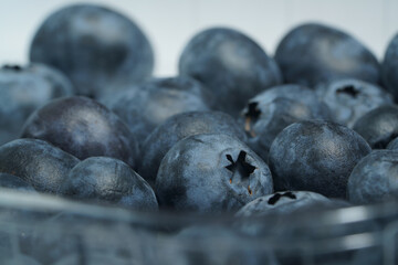 blueberry berries dark blue in a plastic jar