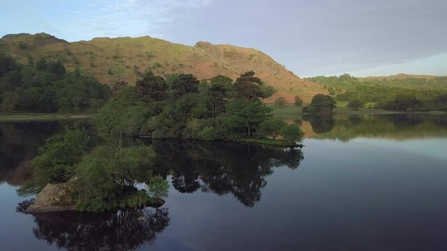 Islands on morning lake Rydal Water, Lake District, Cumbria, United Kingdom