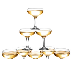 Tower made of glasses with champagne on white background