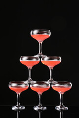 Champagne tower on dark background
