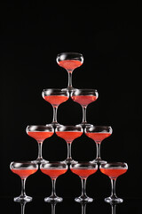Champagne tower on dark background