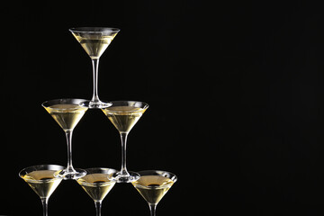 Champagne tower on dark background