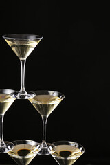 Champagne tower on dark background