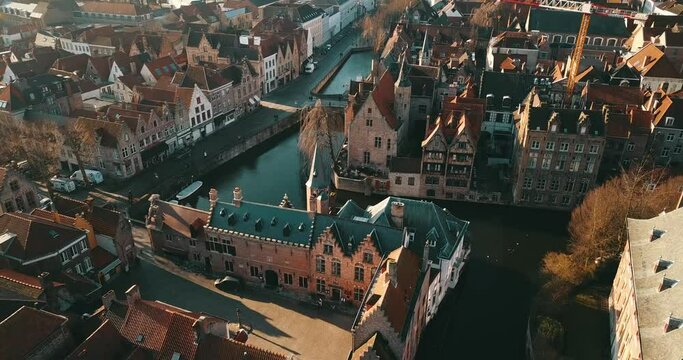 Brugge, Belgium - February 28, 2020: 4K Aerial Footage under the Medieval City Center of Brugge in the Summer Day