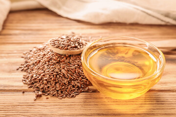 Composition with flax oil on wooden background