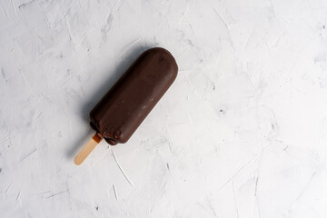 ice cream stick  on dark white background  covered chocolate sticks frozen Popsicle and Lolly sweet...