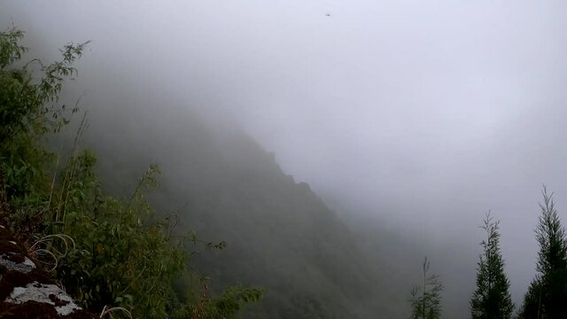 Timelapse of sunset above fog at Zuluk, Sikkim, India.
