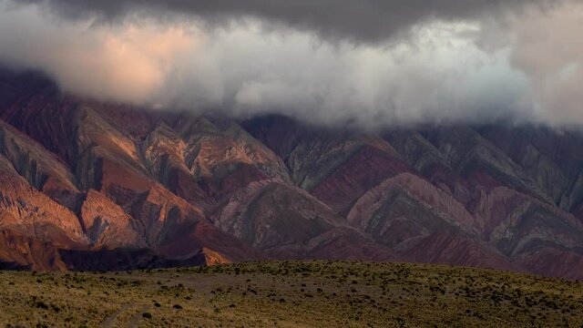 Big colorful mountains of fourteen colors with clouds at sunset with light magic hornocal