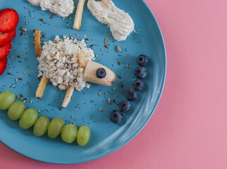 lamb on a plate.
Curd lamb with berries lies on a blue plate, close-up on the left.