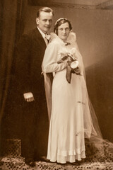 Germany - CIRCA 1920s: Shot of young married couple in studio, Vintage wedding art deco era photo