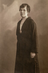 RUSSIA - CIRCA 1920s: Full body shot of young women in studio Vintage Carte de Viste Edwardian era photo