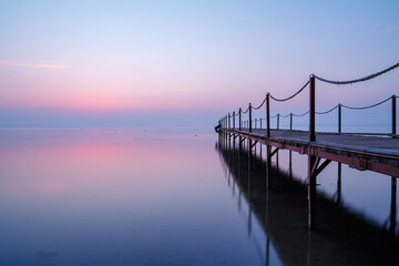 pier on the lake in the early morning