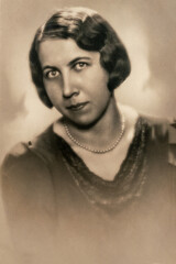 Germany - CIRCA 1930s: Portrait of female in studio. Close up. Vintage Art Deco era photo