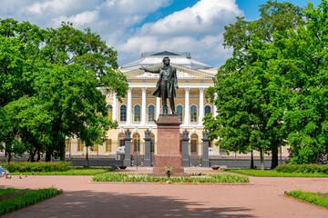 Monument to Russian poet Alexander Pushkin on Culture square and Russian museum at background, Saint Petersburg, Russia