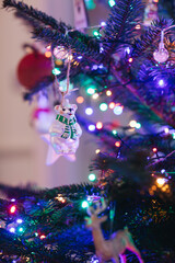 christmas tree decoration, lights, a glass bear toy