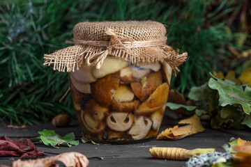 Mushroom Boletus in wooden wicker basket. Boletus edulis over Wood Background, close up on rustic table.  Cooking delicious organic mushroom. Gourmet food,Autumn Cep Mushrooms. Mushrooms Picking