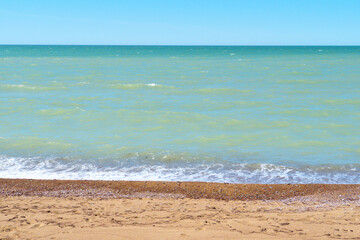 Fototapeta na wymiar Blue sky, turquoise water and sandy beach