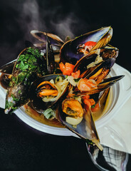 Sea food plate with shrimp and mussels - close up photography