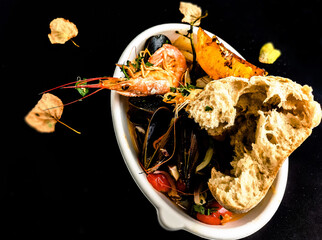 Sea food plate with shrimp and mussels - close up photography