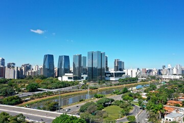 Fototapeta na wymiar Panoramic view of city life scene in the sunny day. Cityscape scenery. Great landscape