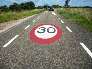Speed limit sign 30 on the road