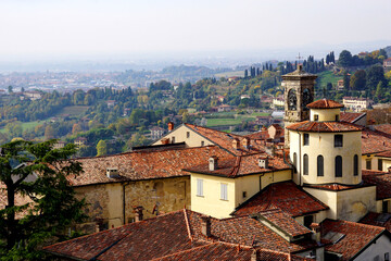 Fototapeta na wymiar Beautiful panorama view over lombardy landscape with curches and hills from Citta Alta in Bergamo, Italy.