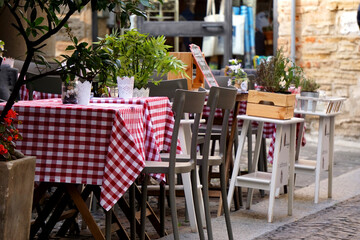 Romantic rustic and cosy italian restaurant, Trattoria Osteria in Italy.