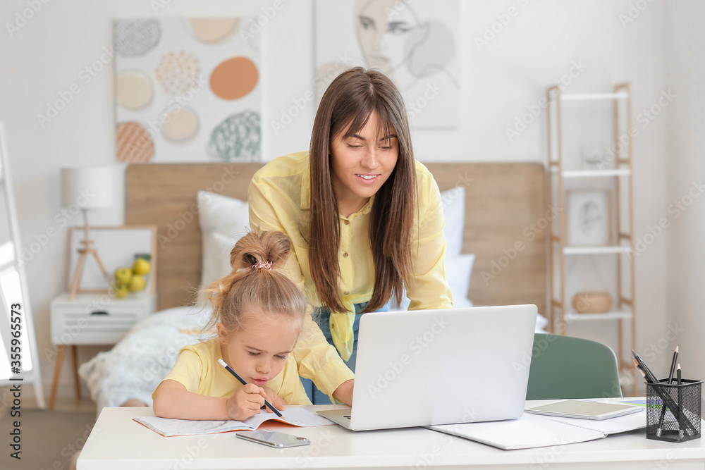 Poster Working mother with her little daughter at home