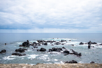 Fototapeta na wymiar Volcanic Rocks in the middle of Atlantic Ocean. São Miguel Island, Azores, Portugal