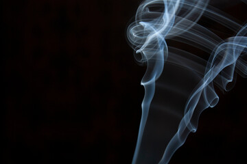 blue smoke on black background