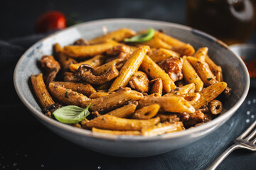 Pasta penne with mushrooms and sauce