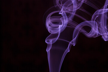 purple smoke on black background