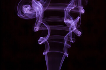 purple smoke on black background